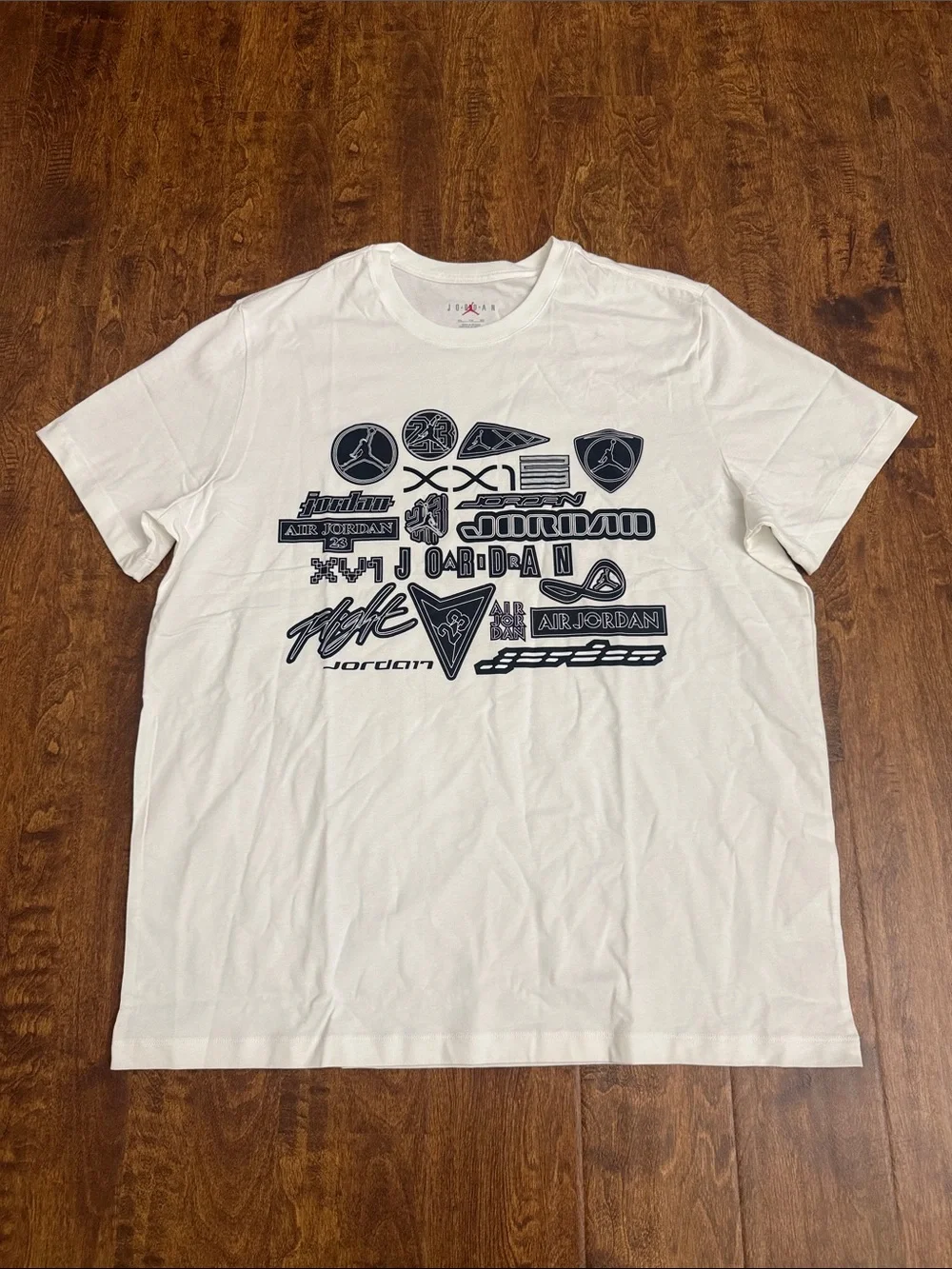 Jordan White Short-Sleeve Tee with Navy Logo Collage